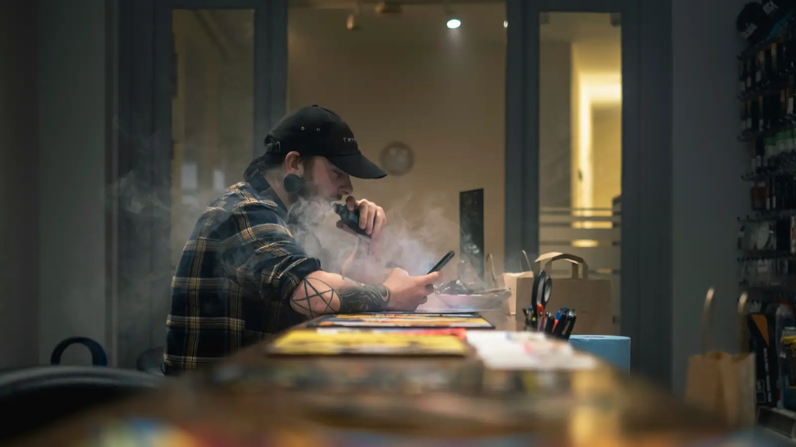 Man vaping in a room
